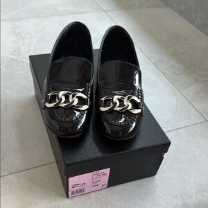 CHANEL Black Patent Loafers with Silver Chain Accent